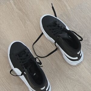 Black and white Puma Hightops